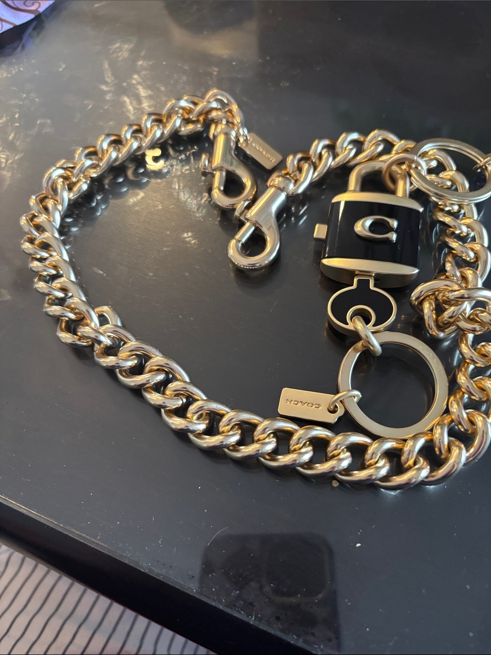 Coach Gold Chain Key & Lock Charm in Black and Gold